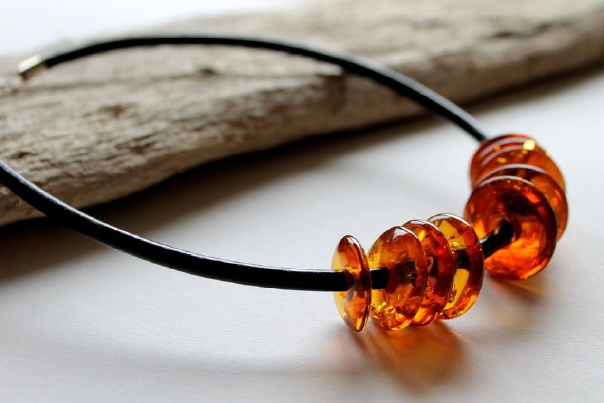 133-Modern-amber-necklace-with-leather-and-amber-donuts-beads-N18.jpg