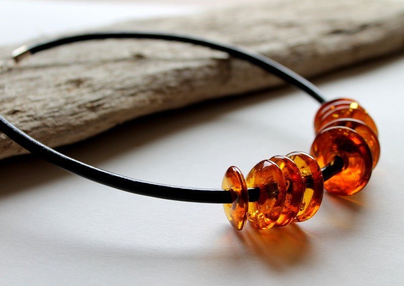 Modern amber necklace with leather and amber donuts beads N18