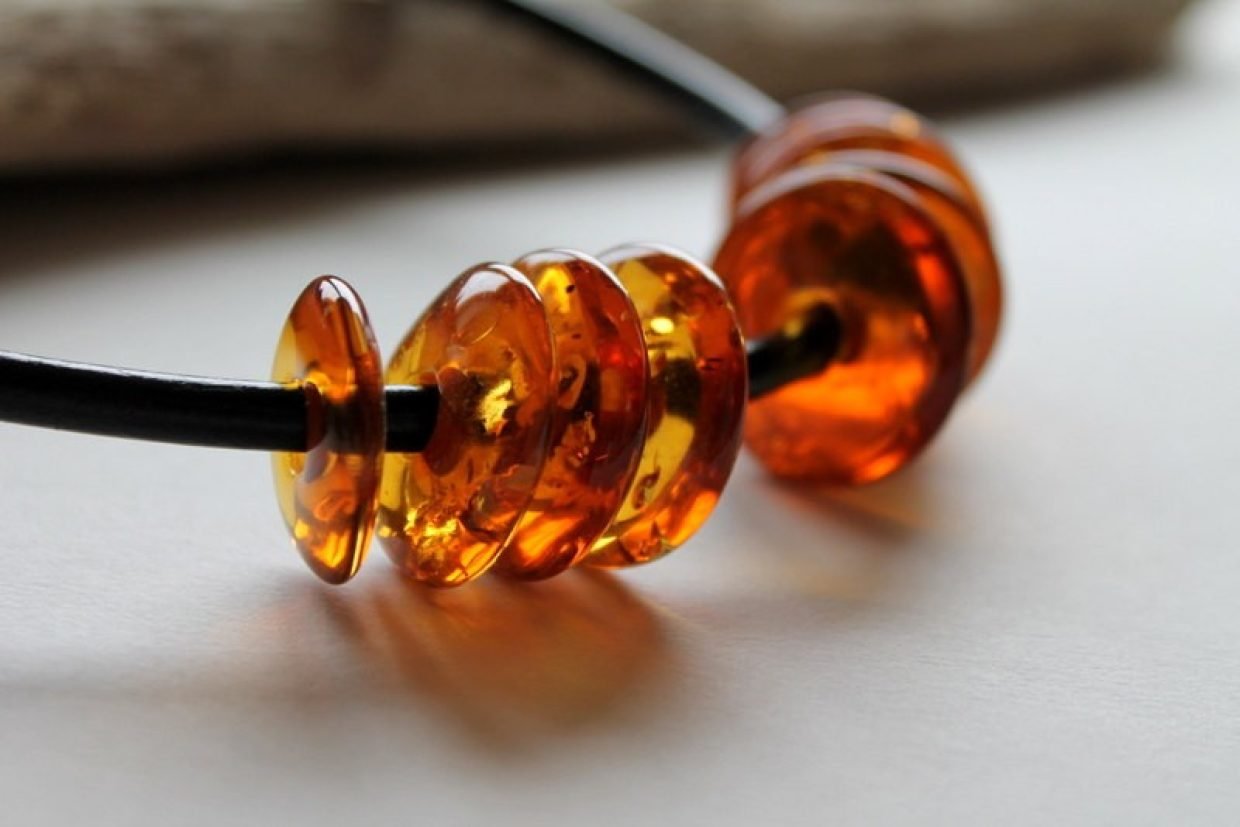134-Modern-amber-necklace-with-leather-and-amber-donuts-beads-N18.jpg