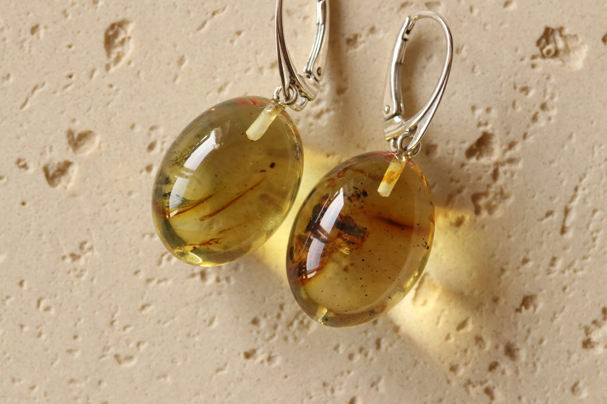 Oval shape clear Baltic amber earrings E379